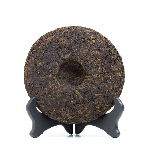 Bu Lang Imperial ripe Pu erh tea cake 2013 dented side