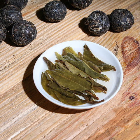 Pu erh Tea Bu Lang old arbor tea brewed leaves