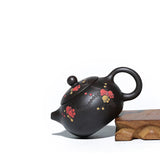 Yi Xing Black Gold Sand teapot carved with Japanese apricot  flower