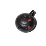 Yi Xing black gold sand teapot top view