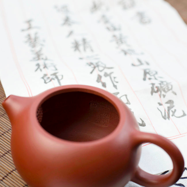 Yi Xing red clay teapot with certificate