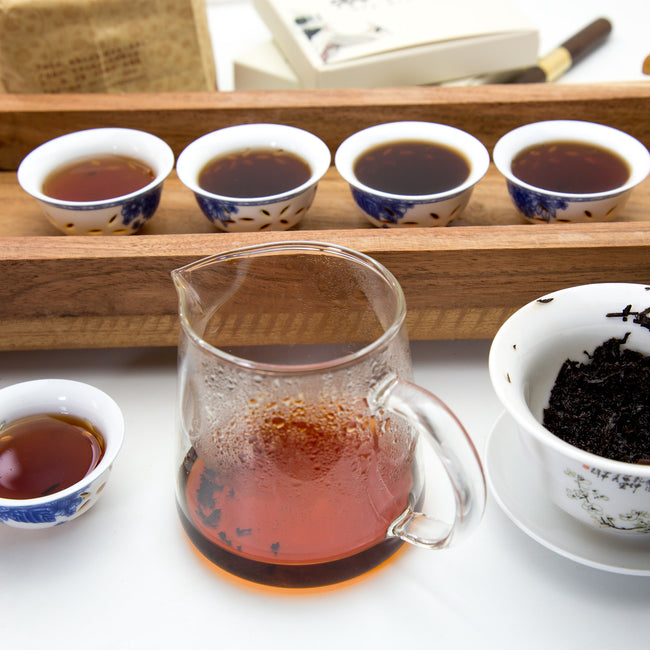 five cups of different ripe pu erh tea