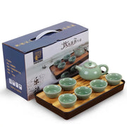green porcelain teapot set with bamboo tea tray