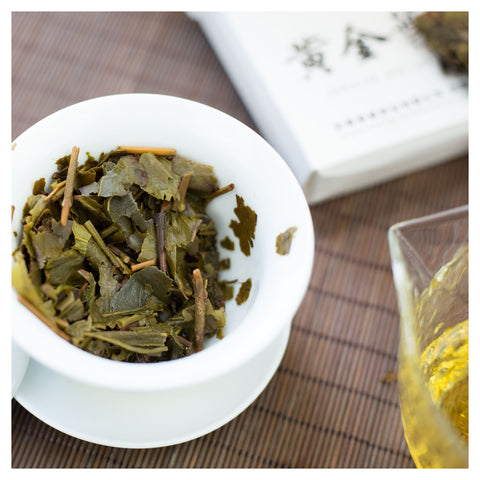 steeped golden leaf raw pu erh tea